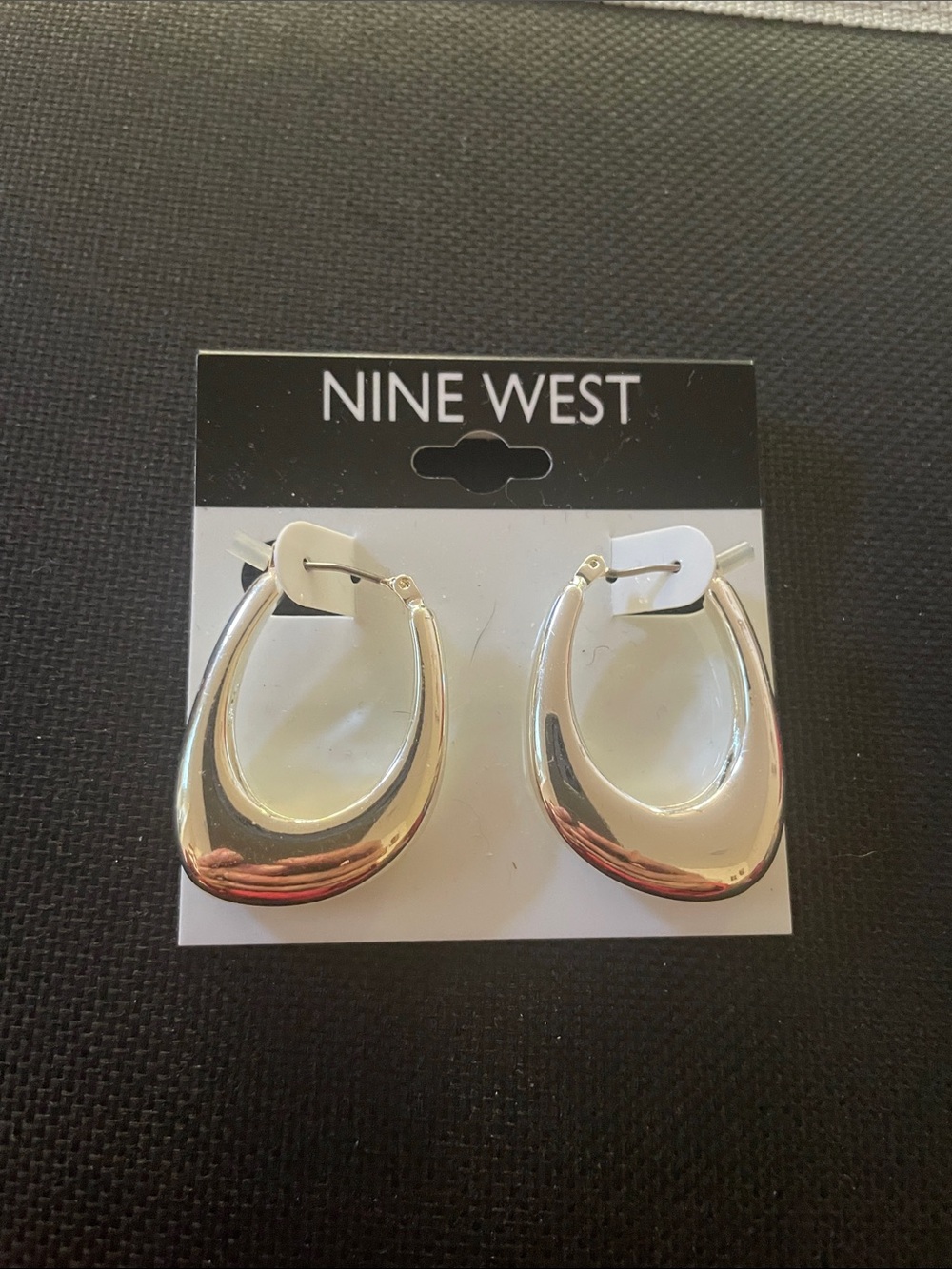 Nine West Silver Tone Puffy Hoop Earrings. Abstract oval. NW crystal detail. NWT